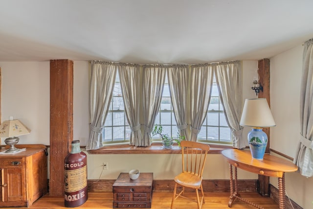 sitting room with wood finished floors