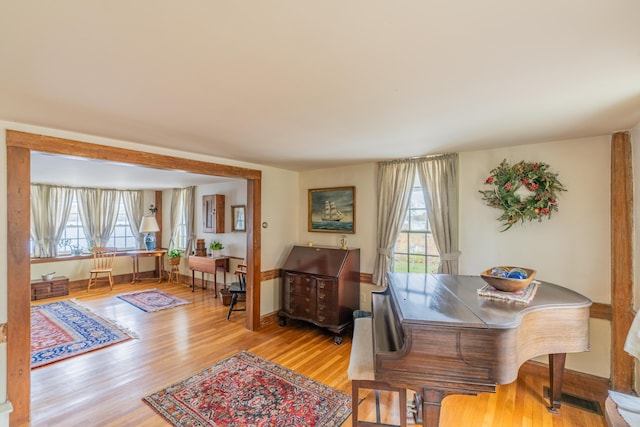 dining area featuring wood finished floors and baseboards
