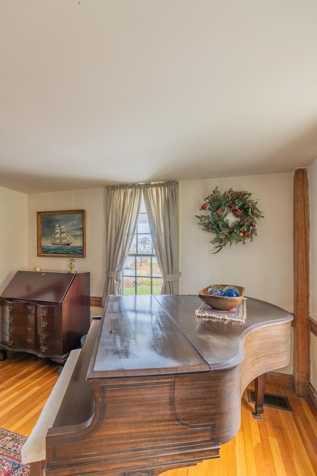 dining room with wood finished floors