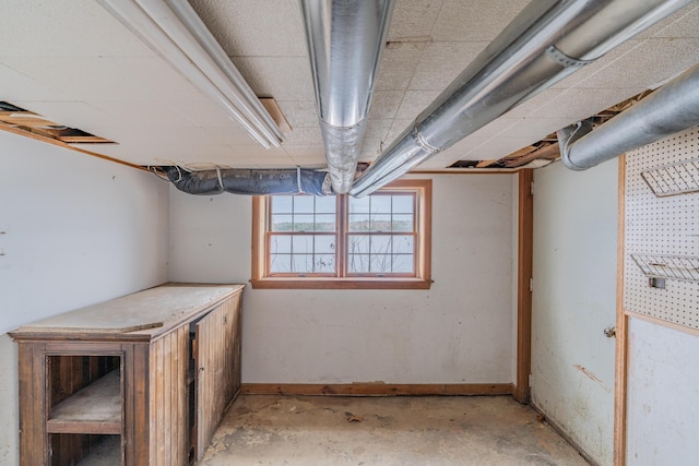 basement featuring baseboards