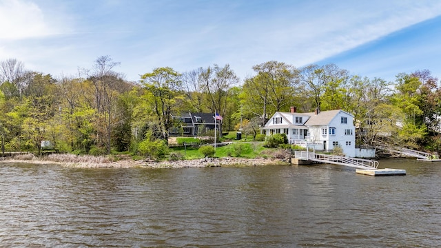 water view featuring a floating dock