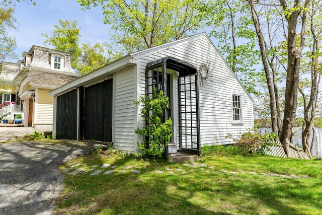 garage featuring driveway