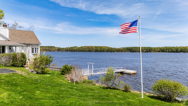 water view featuring a floating dock