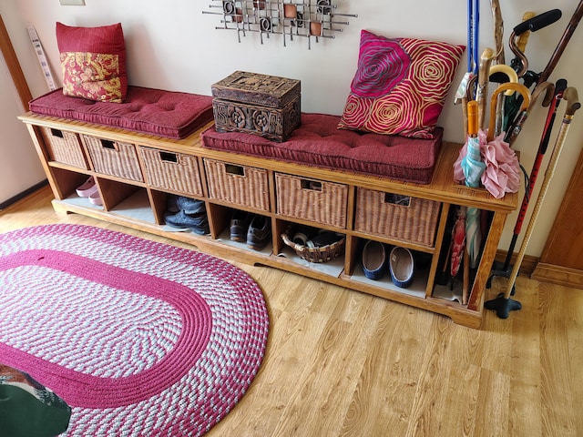 mudroom with wood finished floors