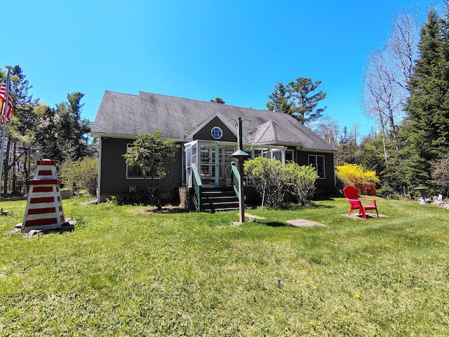 view of front of home with a front lawn