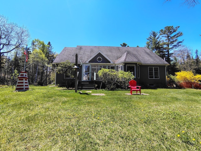 view of front of home with a front lawn