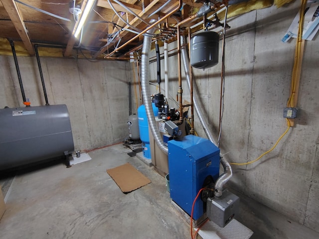 100 Weber Ln, Calais, ME 04619 - unfinished below grade area featuring oil tank and a water pressure tank