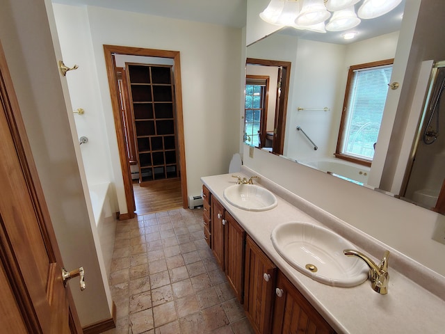 100 Weber Ln, Calais, ME 04619 - full bathroom with stone tile flooring, healthy amount of natural light, and a bath