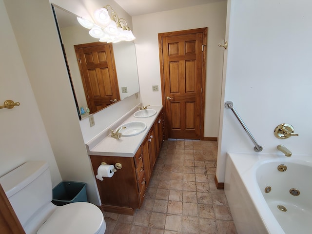 100 Weber Ln, Calais, ME 04619 - full bath featuring stone tile flooring, a tub with jets, and double vanity