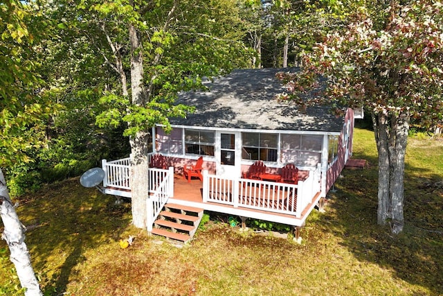 567 Phinney Farm Rd, Lincoln, ME 04457 - back of property featuring a wooden deck, roof with shingles, and a yard