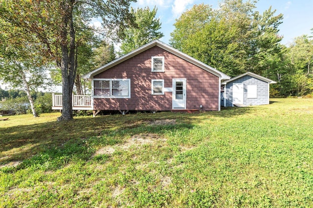 567 Phinney Farm Rd, Lincoln, ME 04457 - rear view of house with a yard and a deck