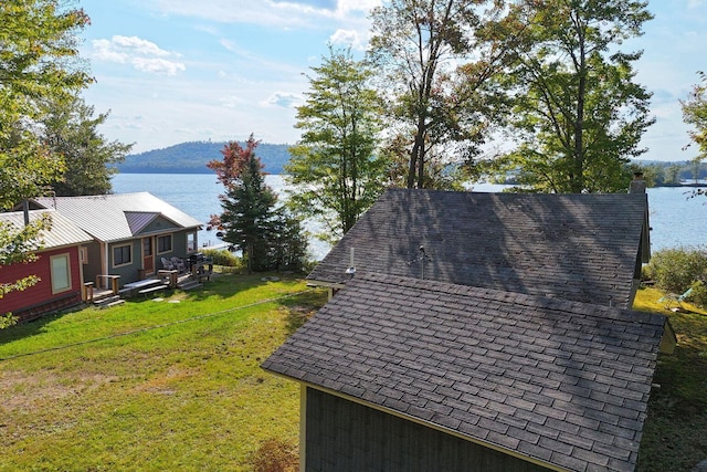 567 Phinney Farm Rd, Lincoln, ME 04457 - exterior view of a water and mountain view and a chimney