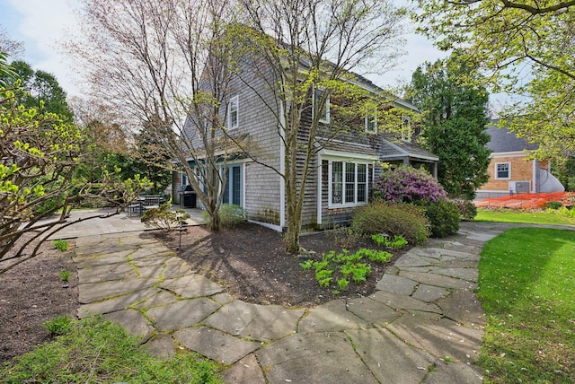 7 Clubhouse Dr, Kennebunk, ME 04043 - view of property exterior with a patio
