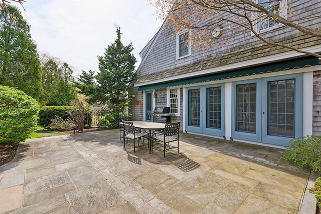 7 Clubhouse Dr, Kennebunk, ME 04043 - view of patio with french doors and outdoor dining area