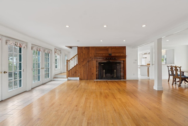 7 Clubhouse Dr, Kennebunk, ME 04043 - living area featuring french doors, stairs, healthy amount of natural light, a baseboard heating unit, and recessed lighting