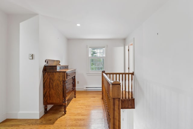 7 Clubhouse Dr, Kennebunk, ME 04043 - corridor with light wood-style flooring, baseboards, a baseboard heating unit, an upstairs landing, and recessed lighting