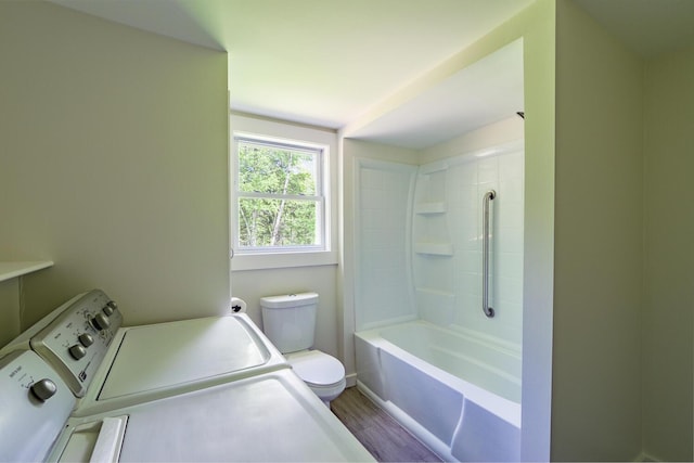 204 Weymouth Rd, Morrill, ME 04952 - full bathroom featuring washing machine and dryer, toilet, wood finished floors, and shower / tub combination