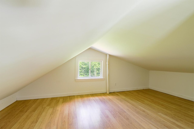 204 Weymouth Rd, Morrill, ME 04952 - additional living space featuring light wood-type flooring, vaulted ceiling, and baseboards
