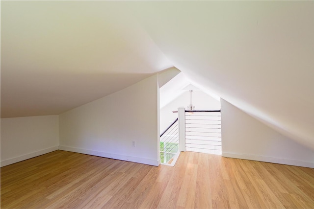 204 Weymouth Rd, Morrill, ME 04952 - additional living space with lofted ceiling, light wood-type flooring, and baseboards