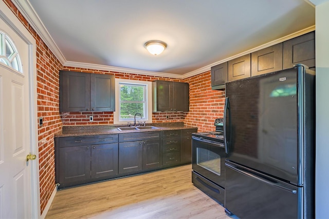 204 Weymouth Rd, Morrill, ME 04952 - kitchen featuring black appliances, a sink, dark countertops, ornamental molding, and brick wall