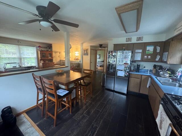 20 Oak Ridge Dr, Chelsea, ME 04330 - kitchen featuring refrigerator with ice dispenser, range with gas cooktop, dark wood finished floors, ceiling fan, and a sink