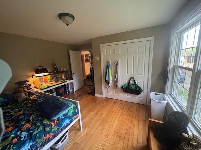 20 Oak Ridge Dr, Chelsea, ME 04330 - bedroom featuring light wood-style flooring and a closet