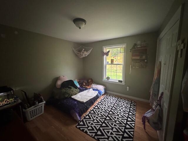 20 Oak Ridge Dr, Chelsea, ME 04330 - bedroom with wood finished floors and baseboards