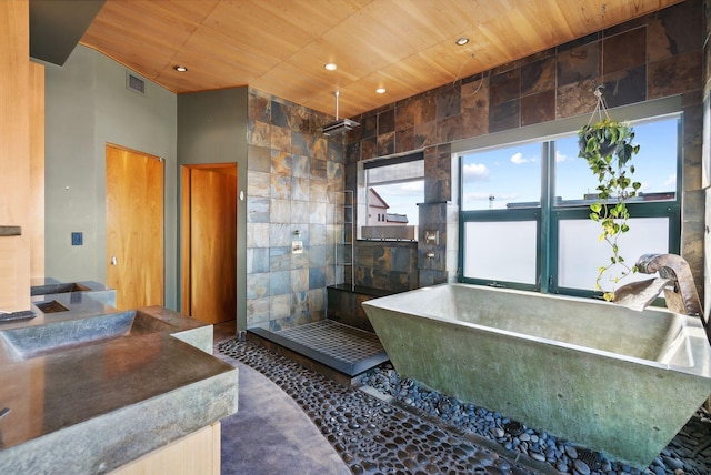 547 Congress St Unit 6, Portland, ME 04101 - full bathroom featuring wooden ceiling, a soaking tub, walk in shower, and recessed lighting