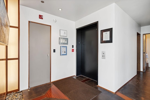 547 Congress St Unit 6, Portland, ME 04101 - entryway with elevator, finished concrete flooring, and recessed lighting