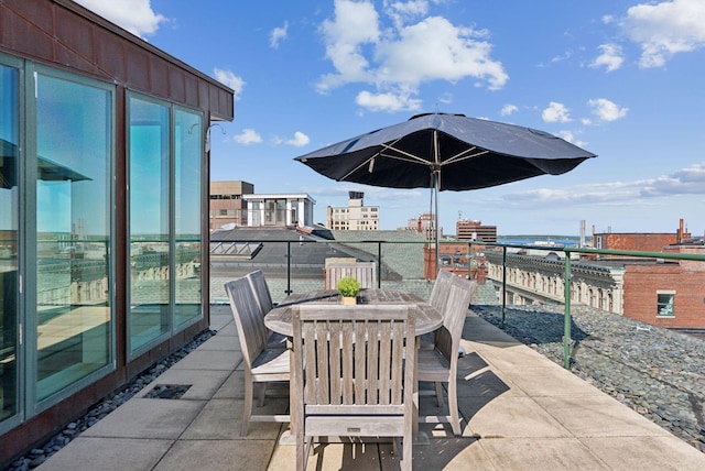 547 Congress St Unit 6, Portland, ME 04101 - view of patio / terrace with outdoor dining space and a balcony
