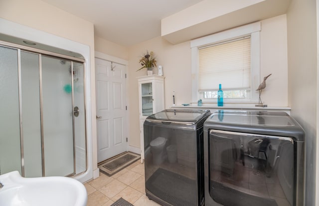 626 Wiscasset Rd, Pittston, ME 04345 - laundry area featuring washing machine and clothes dryer and light tile patterned floors