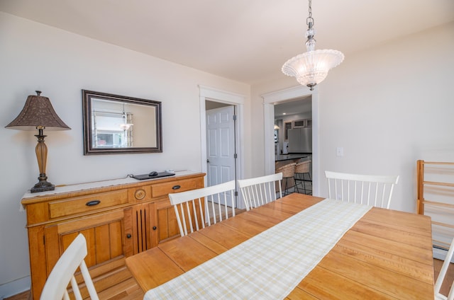 626 Wiscasset Rd, Pittston, ME 04345 - dining area featuring a chandelier