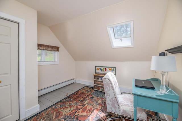 626 Wiscasset Rd, Pittston, ME 04345 - office featuring a skylight, a baseboard radiator, and vaulted ceiling
