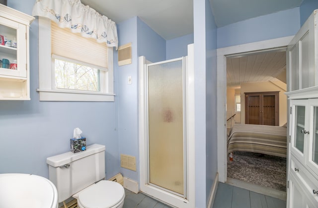 626 Wiscasset Rd, Pittston, ME 04345 - bathroom with toilet, a stall shower, plenty of natural light, baseboards, and wood ceiling