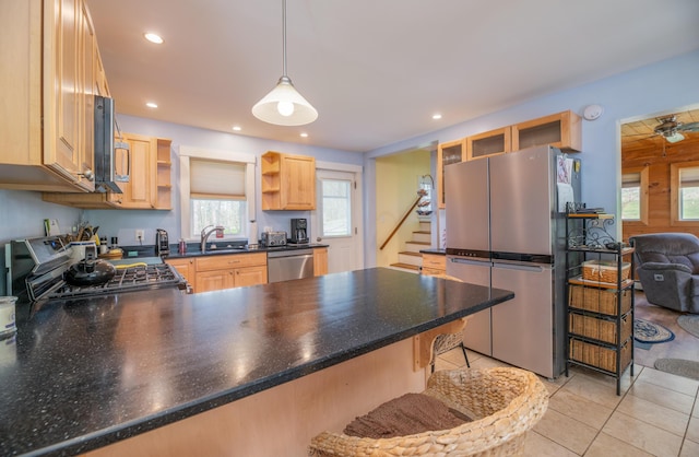 626 Wiscasset Rd, Pittston, ME 04345 - kitchen with appliances with stainless steel finishes, open shelves, a sink, a peninsula, and light brown cabinets