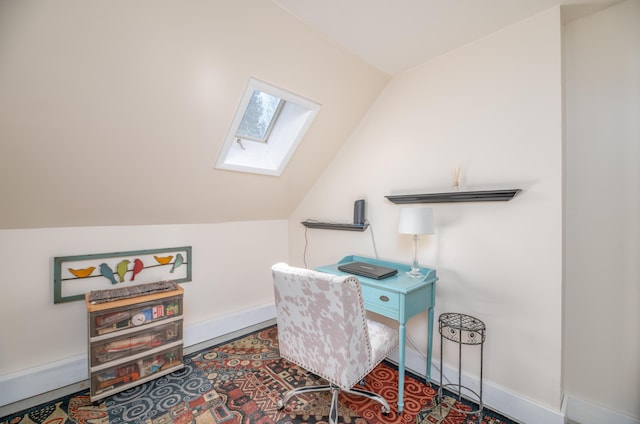 626 Wiscasset Rd, Pittston, ME 04345 - office area featuring a skylight, vaulted ceiling, and baseboards