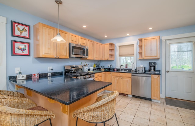 626 Wiscasset Rd, Pittston, ME 04345 - kitchen with appliances with stainless steel finishes, open shelves, light brown cabinetry, a peninsula, and recessed lighting