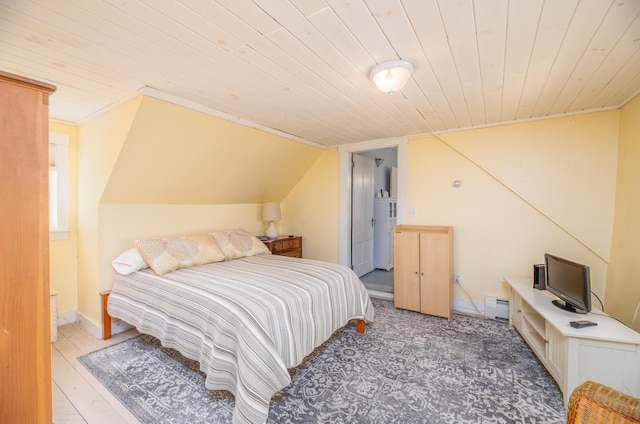 626 Wiscasset Rd, Pittston, ME 04345 - bedroom featuring wood ceiling and a baseboard heating unit