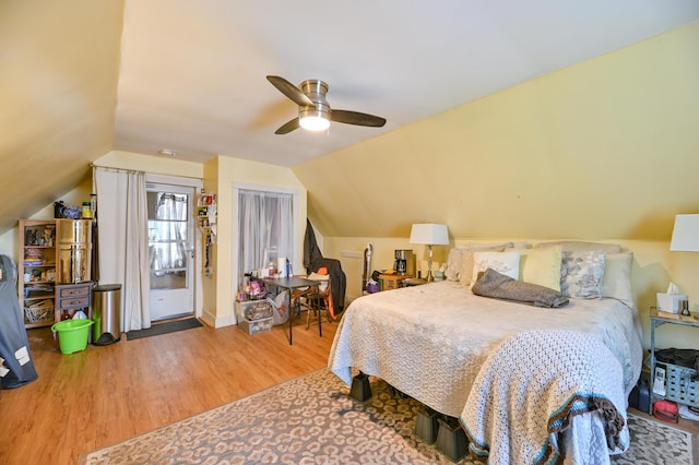 626 Wiscasset Rd, Pittston, ME 04345 - bedroom with wood finished floors, lofted ceiling, ceiling fan, and access to outside
