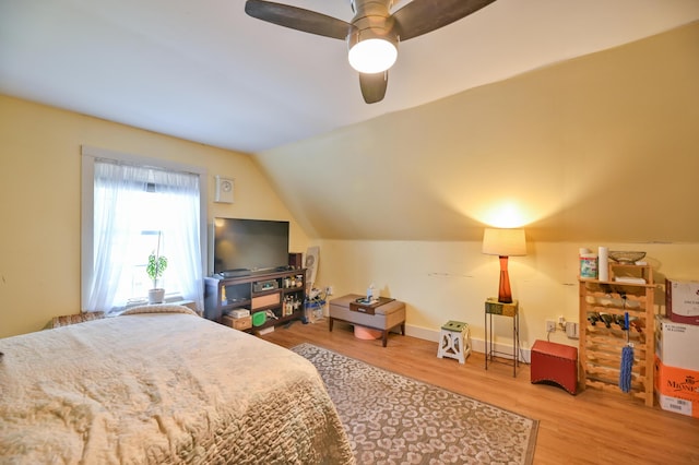 626 Wiscasset Rd, Pittston, ME 04345 - bedroom with wood finished floors, vaulted ceiling, and a ceiling fan