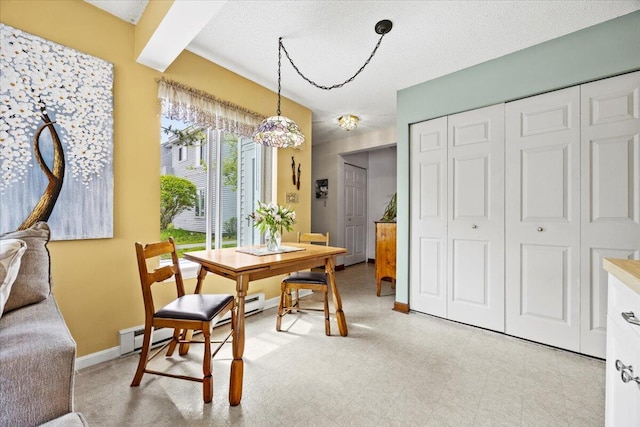 18 Ocean St Unit 72, South Portland, ME 04106 - dining space with light flooring, baseboards, and a textured ceiling