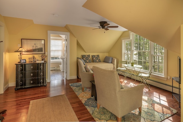 living area featuring healthy amount of natural light, a ceiling fan, wood finished floors, a baseboard heating unit, and lofted ceiling