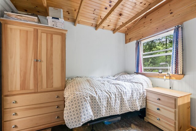 23 Woodland Rd, Winthrop, ME 04364 - bedroom featuring wood ceiling and dark wood finished floors