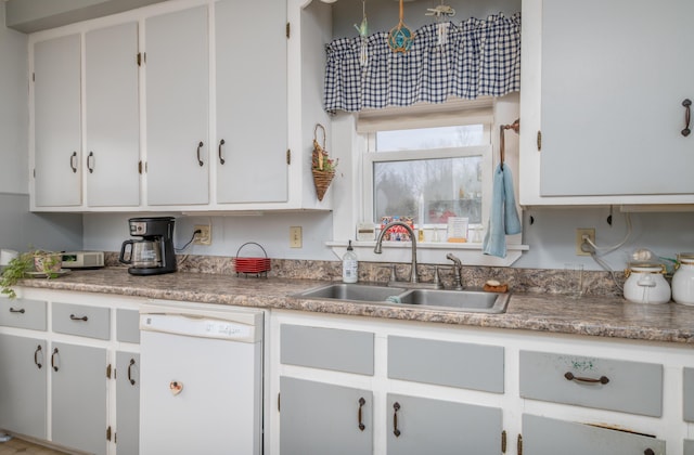 1 High St, Hallowell, ME 04347 - kitchen with dishwasher, a sink, and white cabinets