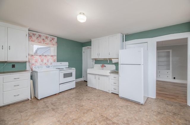 1 High St, Hallowell, ME 04347 - kitchen with white appliances, washer / dryer, a sink, and light countertops