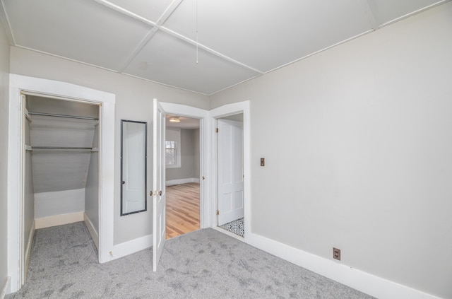 1 High St, Hallowell, ME 04347 - unfurnished bedroom with attic access, carpet floors, baseboards, a walk in closet, and a closet