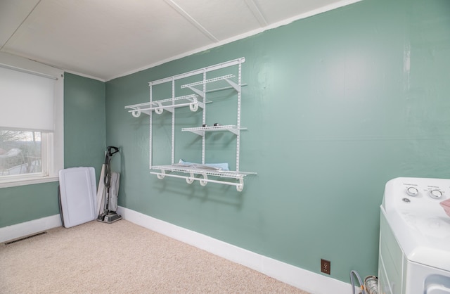 1 High St, Hallowell, ME 04347 - clothes washing area featuring washer / clothes dryer, carpet flooring, and baseboards
