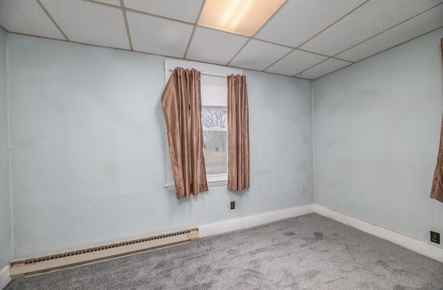 1 High St, Hallowell, ME 04347 - unfurnished room with a baseboard radiator, carpet flooring, and a drop ceiling
