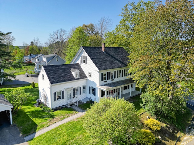 1 High St, Hallowell, ME 04347 - rear view of house featuring a yard, a chimney, and a shingled roof