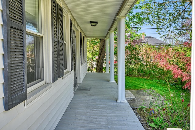 1 High St, Hallowell, ME 04347 - wooden deck with a porch